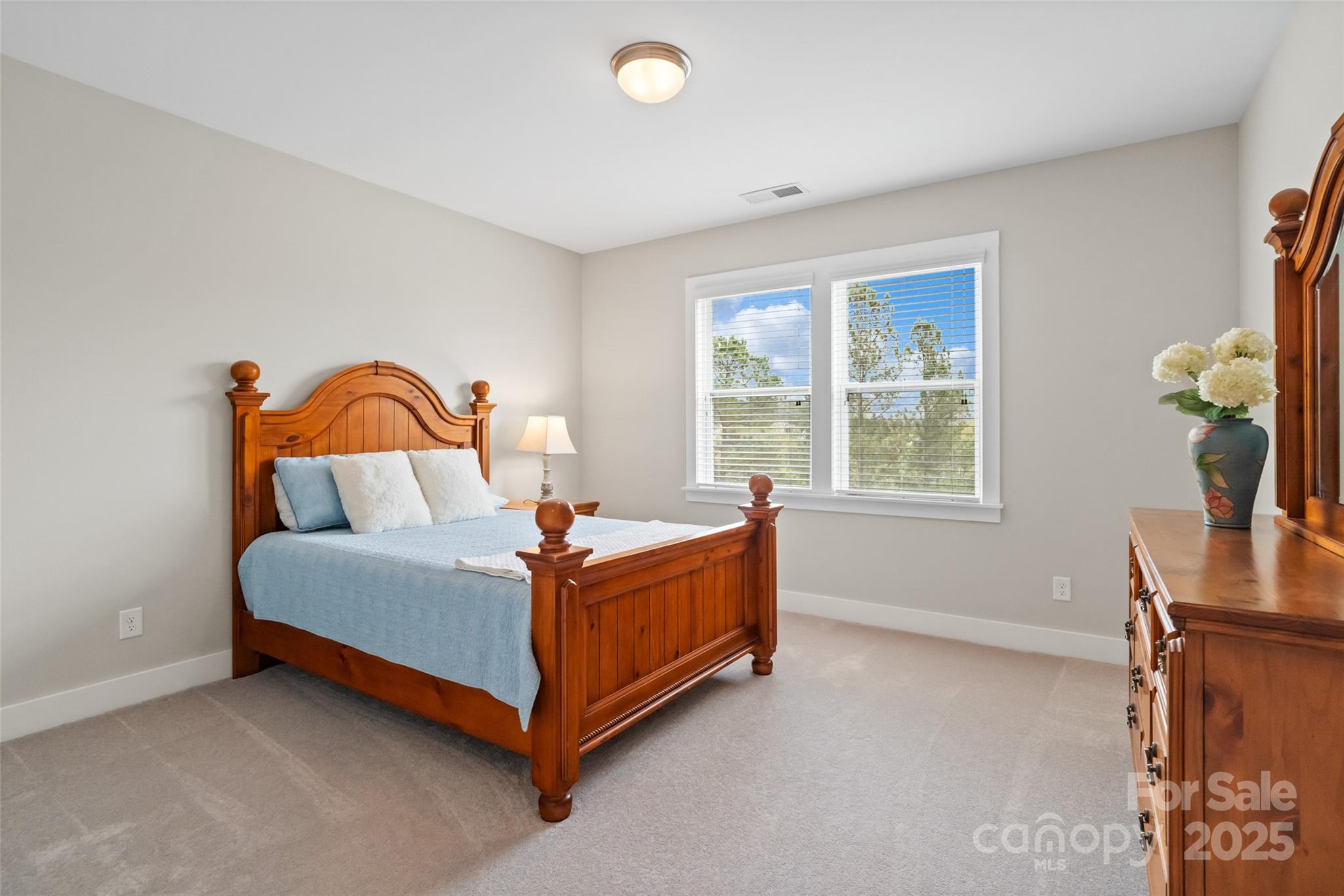 1953 Masons Bend Drive Fort Mill, SC 29708 - Photo 26 of 40 a bed sitting in a room next to a window