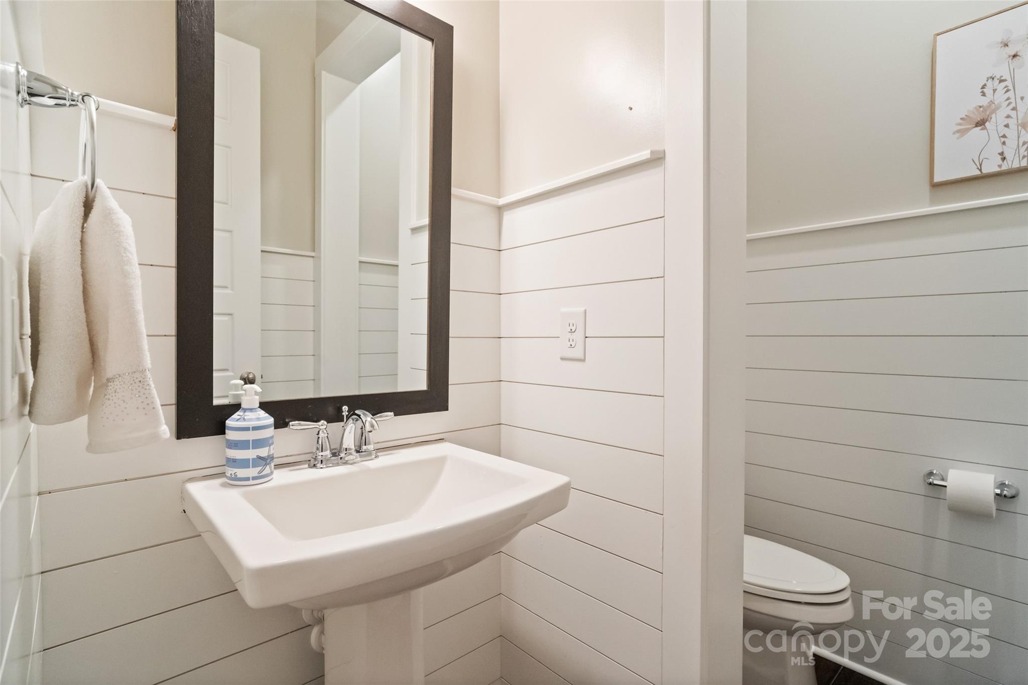 1953 Masons Bend Drive Fort Mill, SC 29708 - Photo 7 of 40 a bathroom with a sink toilet and mirror