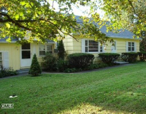 32 Ironworks Hill Road Brookfield, CT 06804 - Photo 1 of 1 a front view of a house with a garden