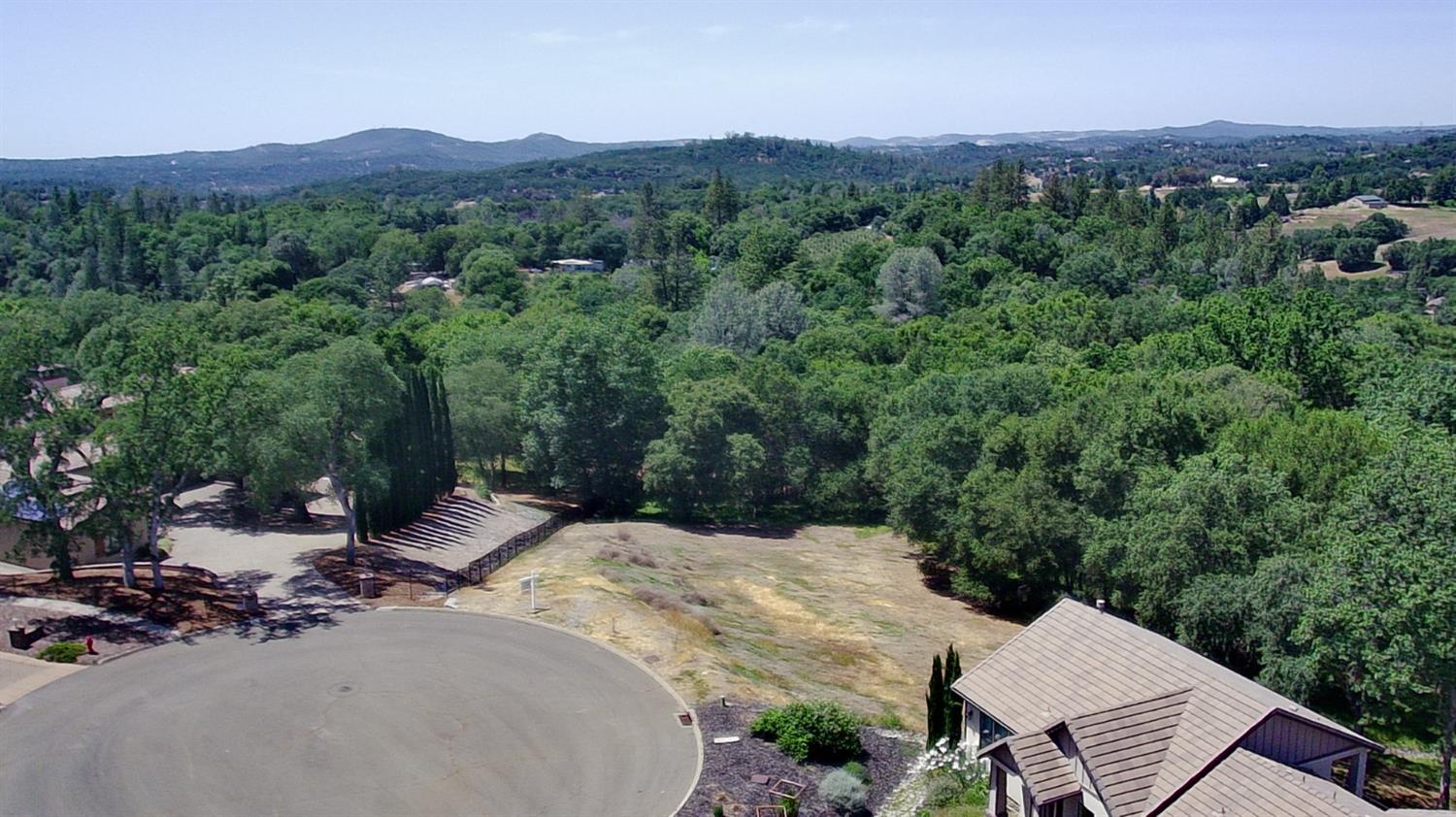 3390 Morel Way Placerville, CA 95667 - Photo 1 of 22 an aerial view of a house with mountain view