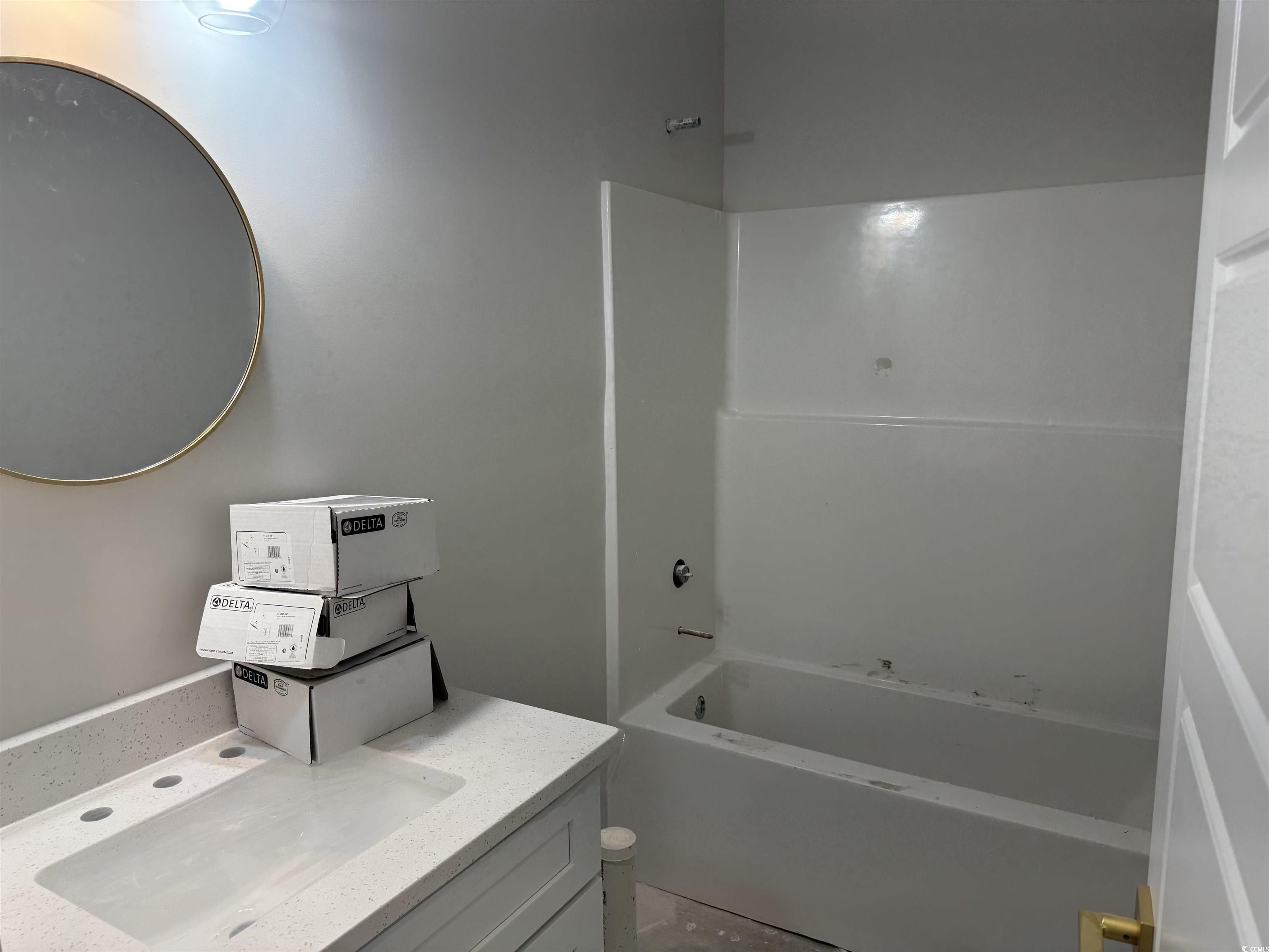 409 St John Road Galivants Ferry, SC 29544 - Photo 13 of 17 Full bathroom featuring shower / bath combination and vanity