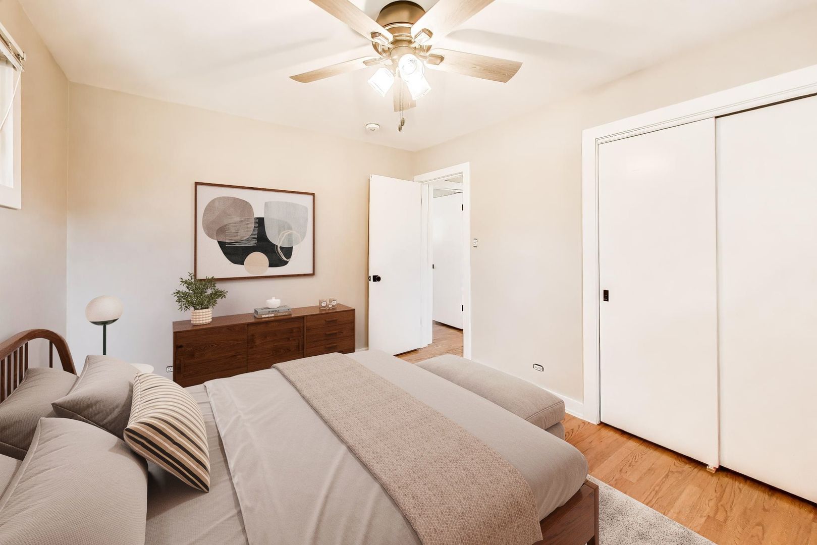 1916 Courtland Avenue Park Ridge, IL 60068 - Photo 14 of 31 a bedroom with a bed and a chandelier