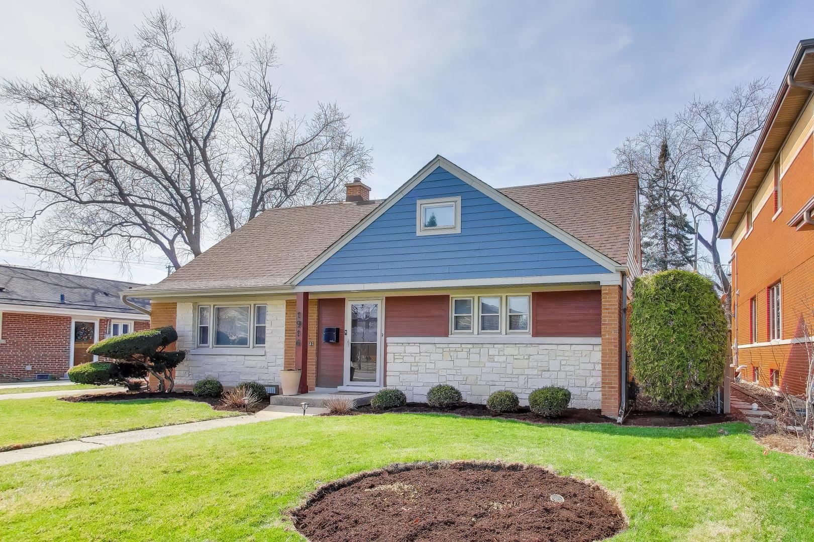 1916 Courtland Avenue Park Ridge, IL 60068 - Photo 2 of 31 a front view of a house with a garden