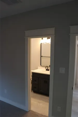 a bathroom with a shower and a toilet