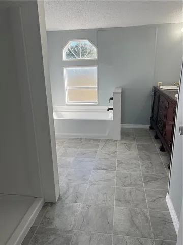 a view of a bathroom with a sink