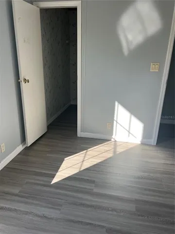 a view of a backyard with trees