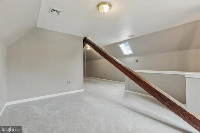 a view of a hallway with entryway
