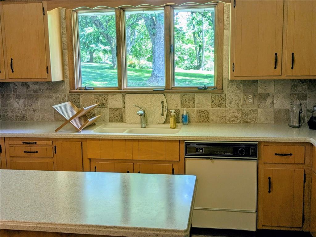 942 Shenango Road Beaver Falls, PA 15010 - Photo 9 of 38 PLENTY OF CABINETS, PICTURE WINDOW OVERLOOKING BEAUTIFUL YARD,