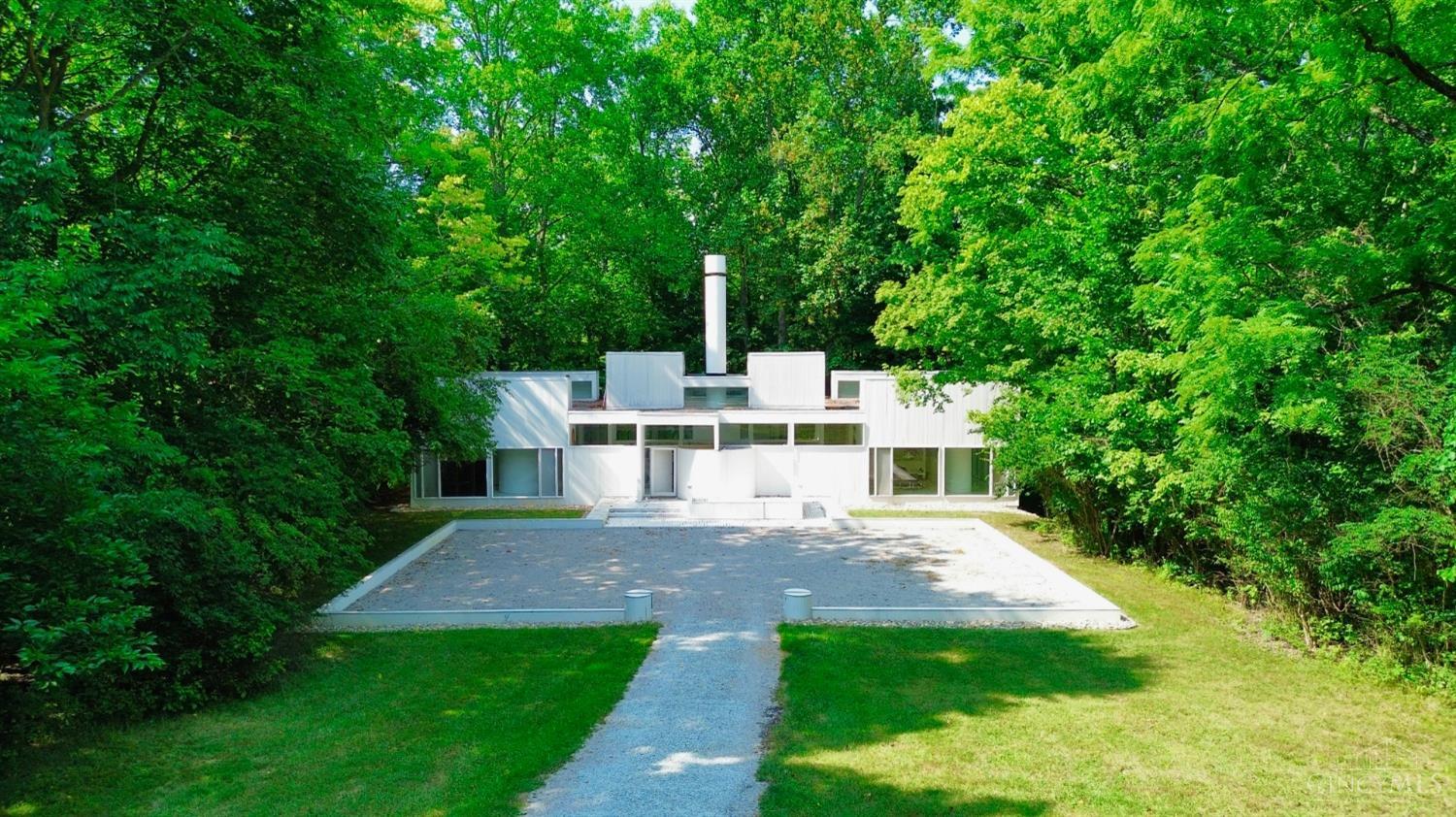 751 Old Locust Hill Road Cincinnati, OH 45245 - Photo 3 of 62 "Although he is best known for elegant, white, geometric modern houses, which are works of art in their own rights, he also made important contributions to the art of architecture in the area of handicapped accessibility, an area that became important during this period as a result of the passage of the Americans with Disabilities Act, which affects almost every aspect of design. In two important houses for wheelchair-bound clients -- the Irwin Hanensons in Bond Hill and the Hugh Hawkins family in Indian Hill -- Niland proved that it is possible to create beautiful, spirit enhancing architecture while meeting the complex needs of the disabled.These clients were so important to him that when he built his own house (“Mary’s House,” named for his wife, Mary Krohn Niland), he designed it to be accessible to them with wide corridors, no steps and easyturnarounds.”