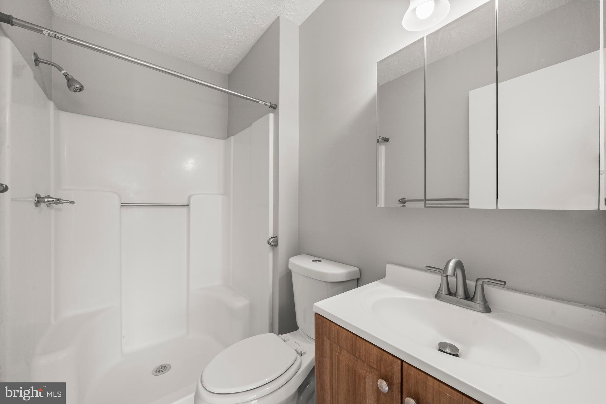 4001 Bittern Court Waldorf, MD 20603 - Photo 39 of 53 a bathroom with a sink toilet and shower