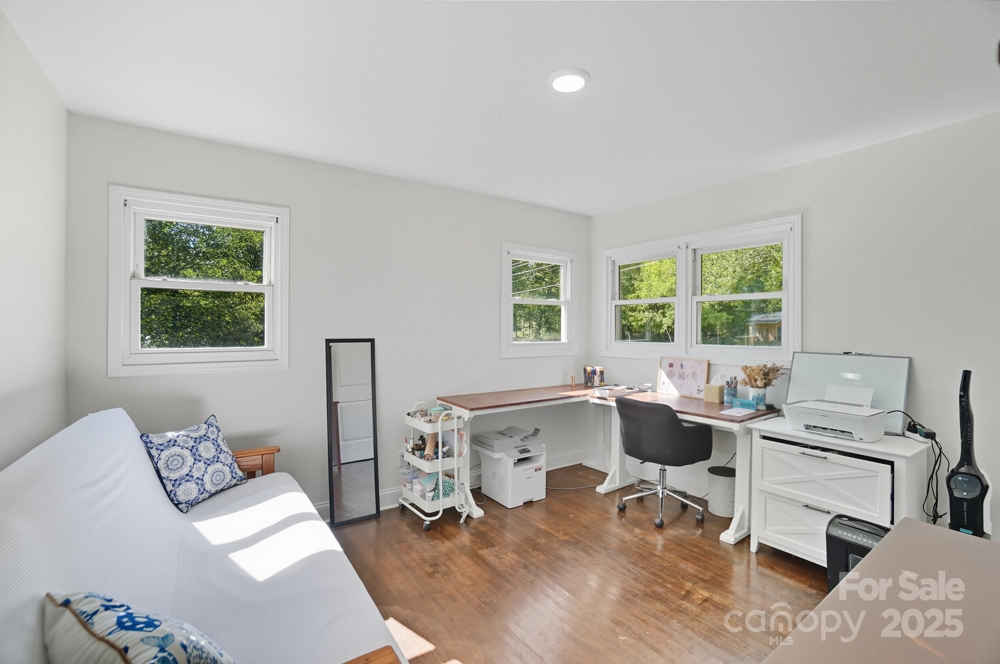 813 Bethlehem Road Kings Mountain, NC 28086 - Photo 29 of 39 a living room with furniture a large window and desk