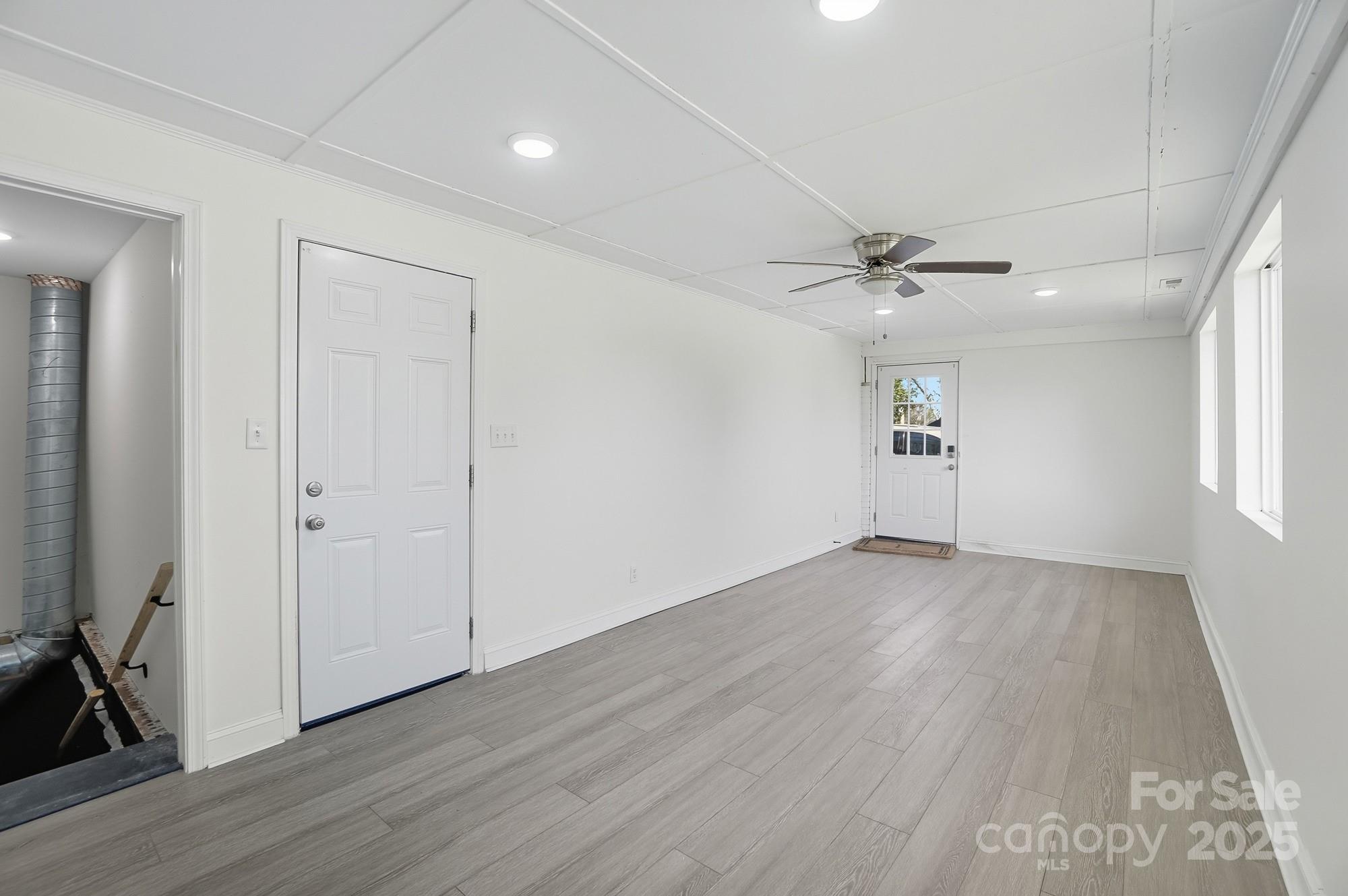 813 Bethlehem Road Kings Mountain, NC 28086 - Photo 32 of 39 wooden floor in an empty room with a window