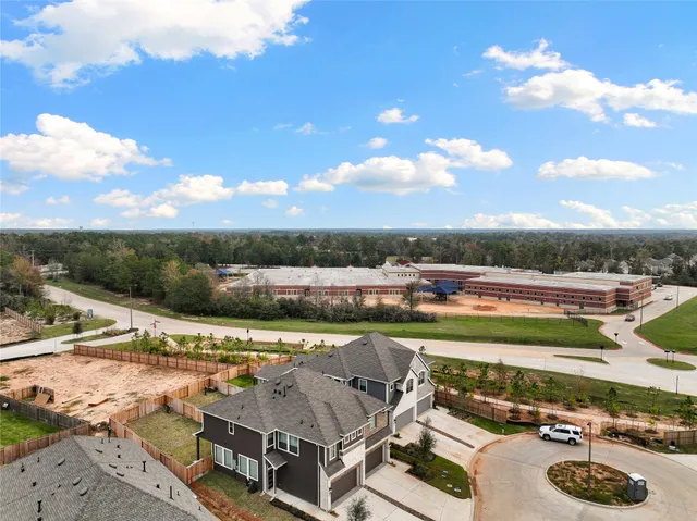 a view of a lake with a yard