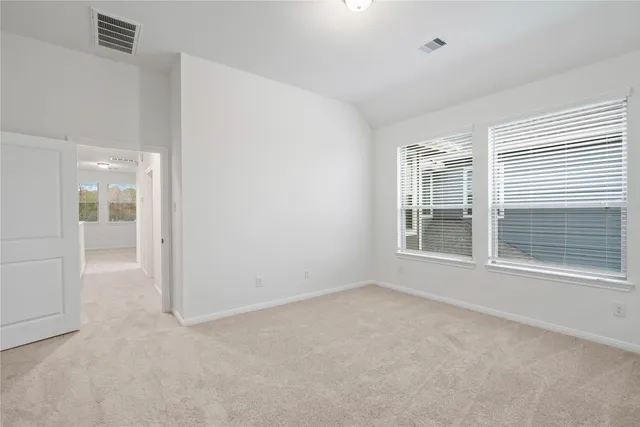 an empty room with windows