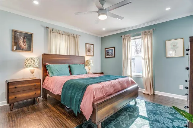 a bedroom with bed and a window