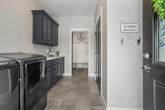 a bedroom with a bed and ceiling fan