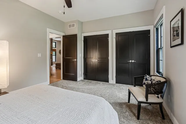 a view of a house with sitting area and swimming pool