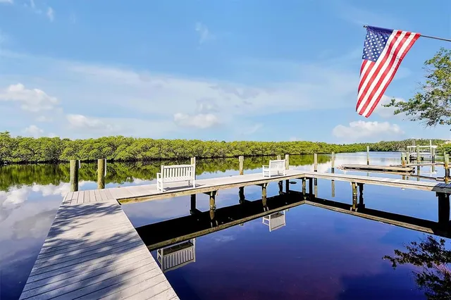 a view of a yard with swimming pool