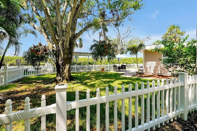 a bathroom with a toilet a sink and a mirror