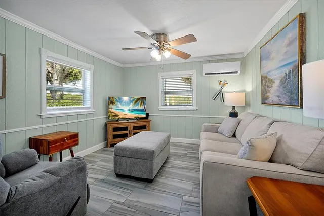 a balcony with table and chairs