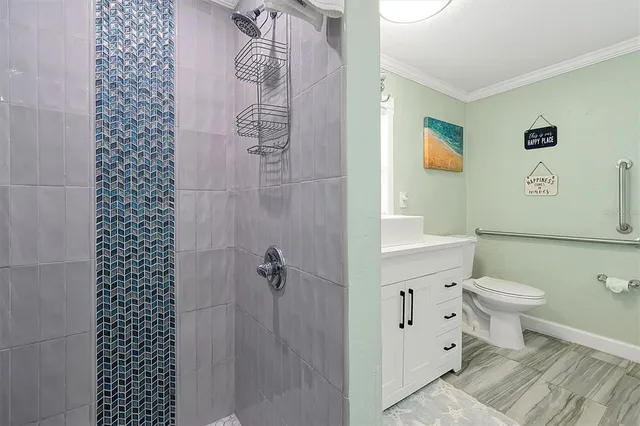a view of a patio with table and chairs and wooden floor