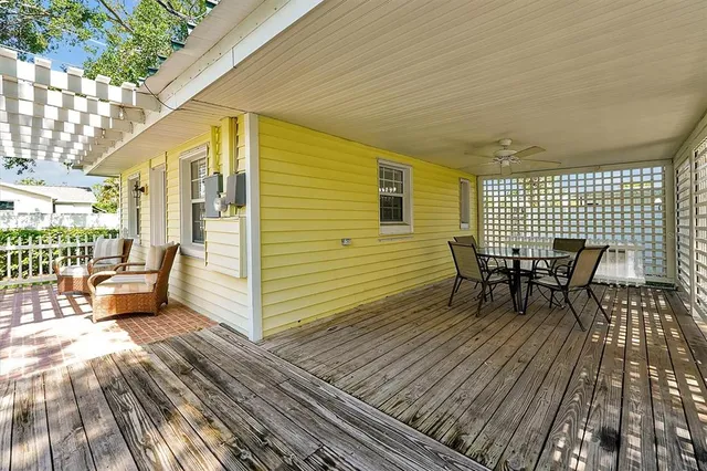 a bedroom with a bed and a desk