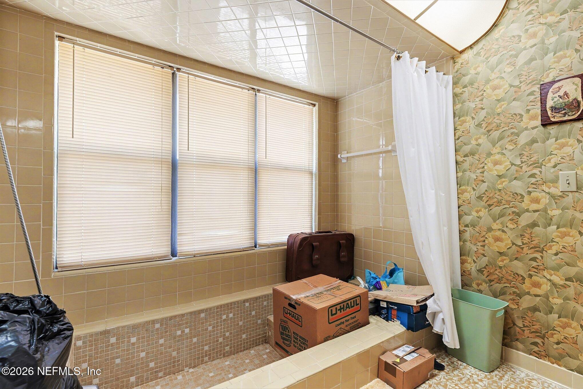 2551 Ridgecrest Avenue Orange Park, FL 32065 - Photo 14 of 28 a living room with furniture and a window