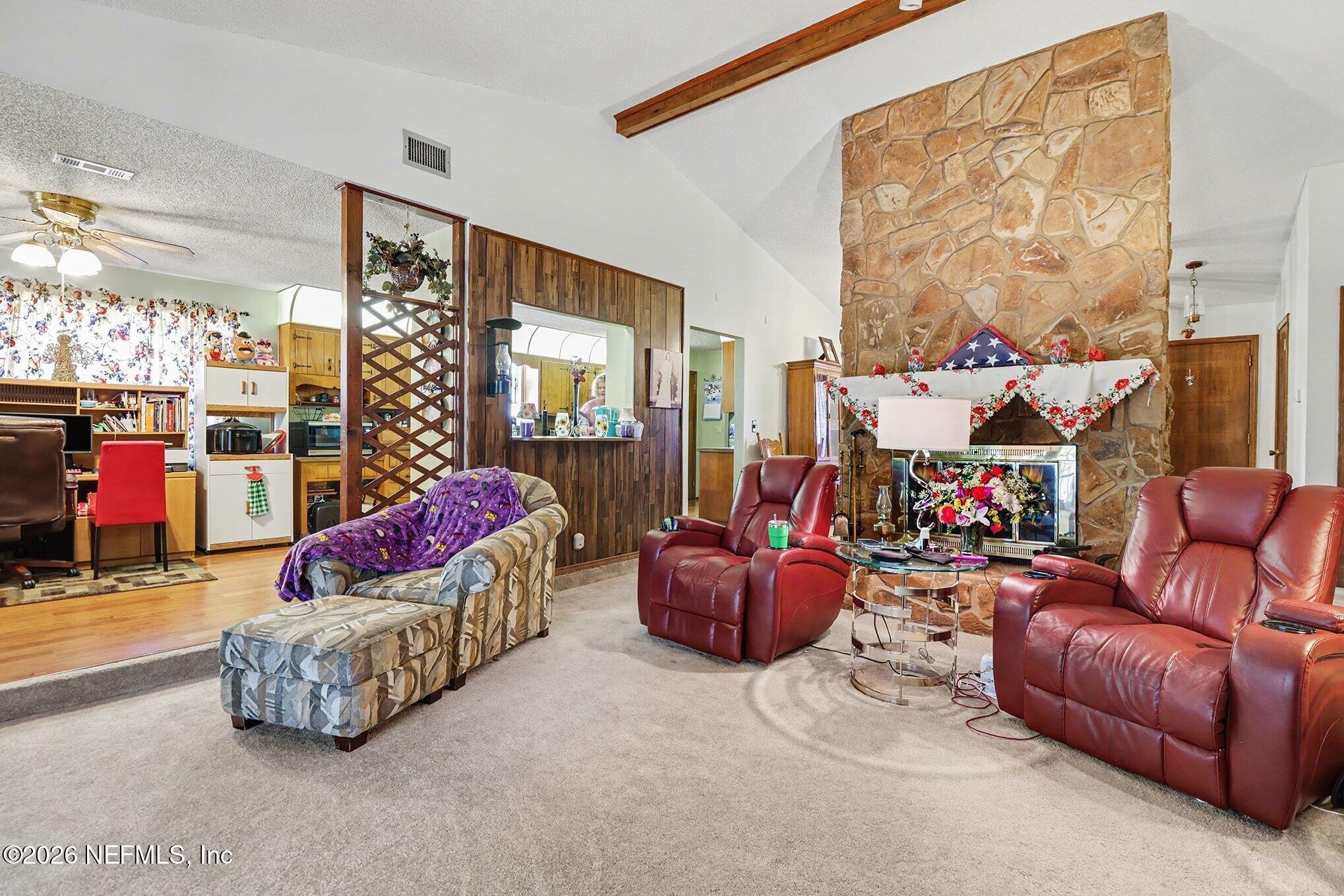 2551 Ridgecrest Avenue Orange Park, FL 32065 - Photo 8 of 28 a living room with furniture and a floor to ceiling window