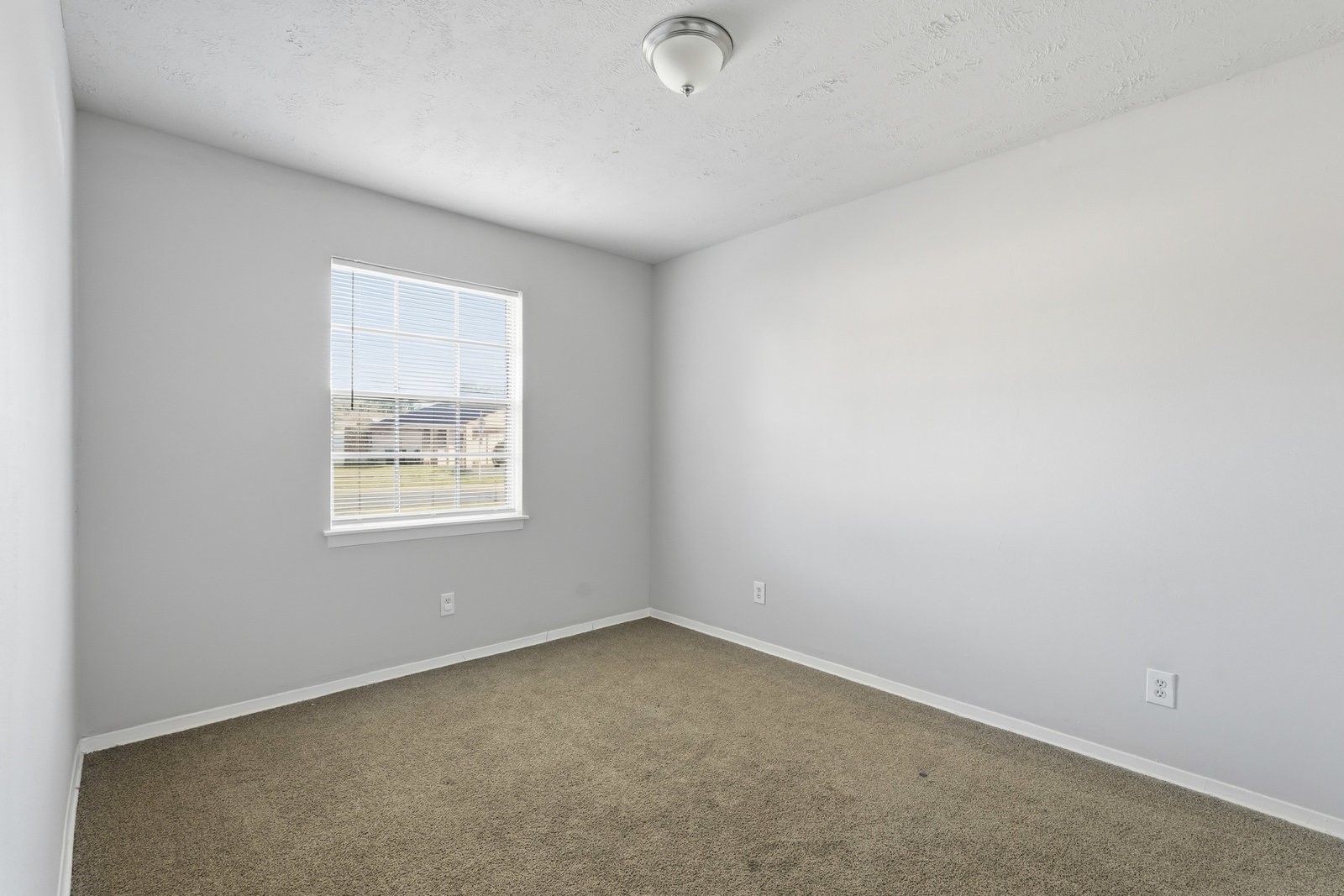 3427 Prudence Drive Houston, TX 77045 - Photo 19 of 25 an empty room with a window