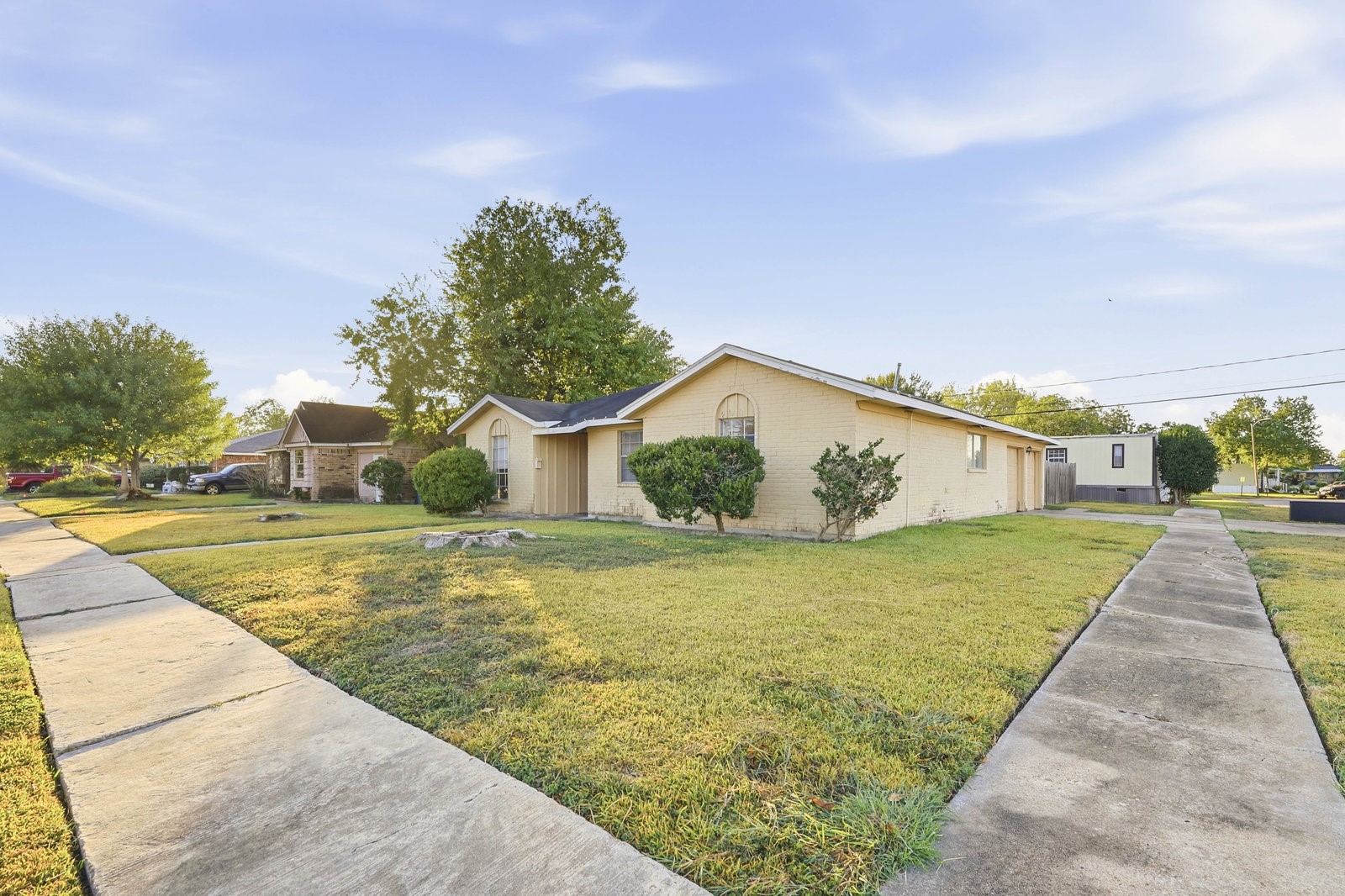 3427 Prudence Drive Houston, TX 77045 - Photo 2 of 25 a swimming pool with trees in the background