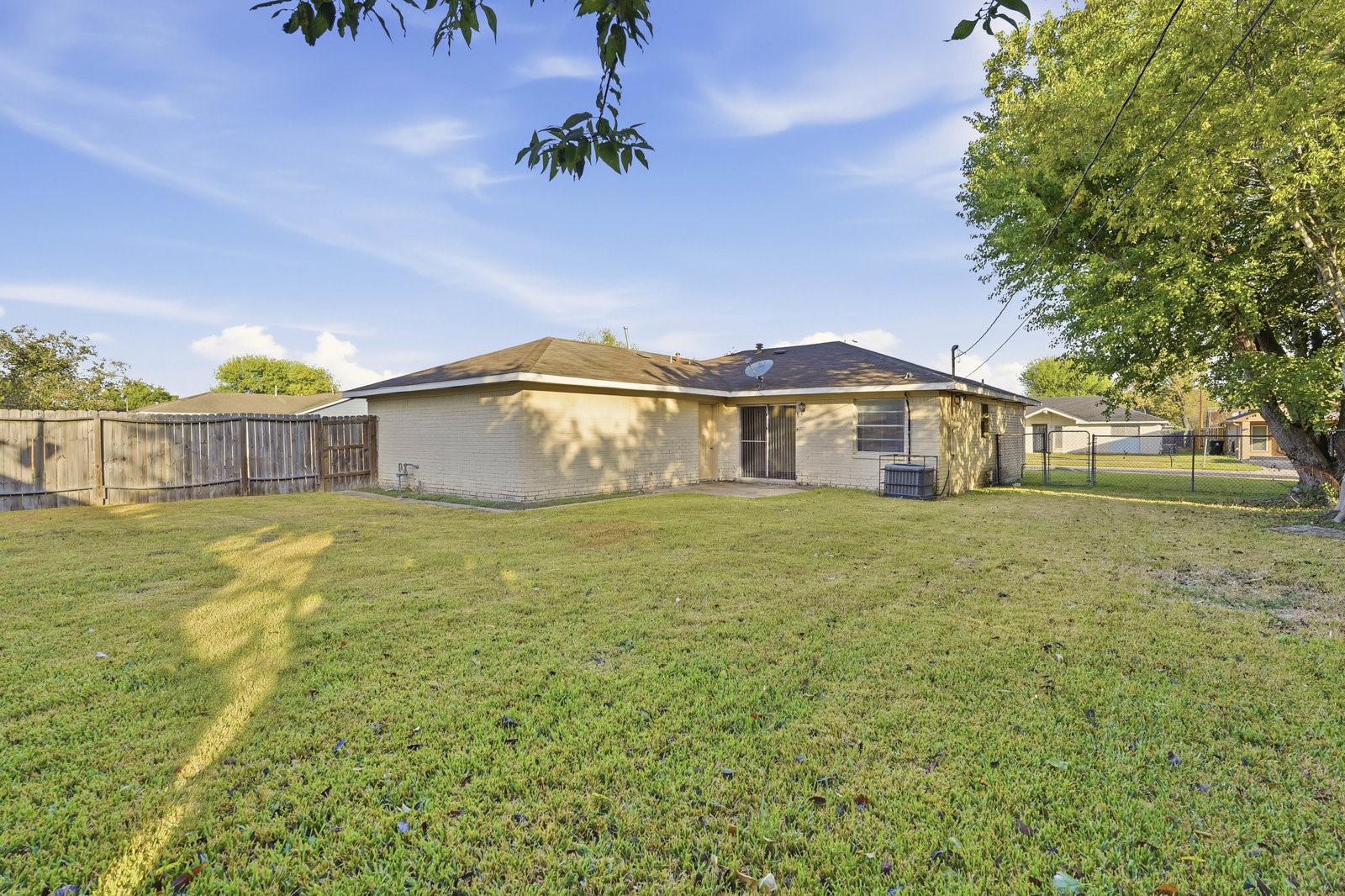 3427 Prudence Drive Houston, TX 77045 - Photo 25 of 25 a front view of a house with garden