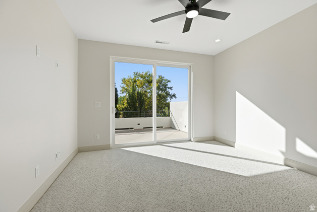 226 East 1100 North Hurricane, UT 84737 - Photo 43 of 49 Spare room with light carpet and a ceiling fan