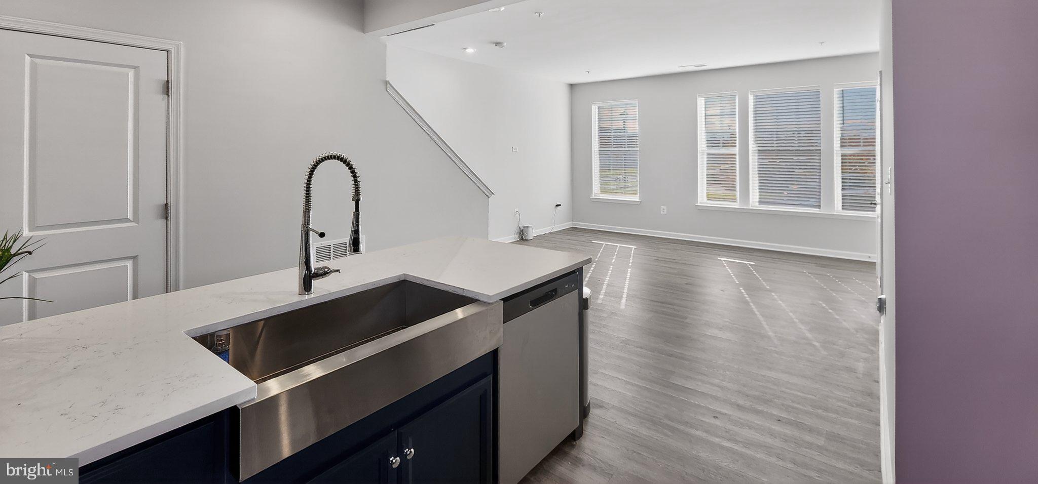 10570 Sally Ride Lane Lanham, MD 20706 - Photo 11 of 32 a kitchen with a sink and a window