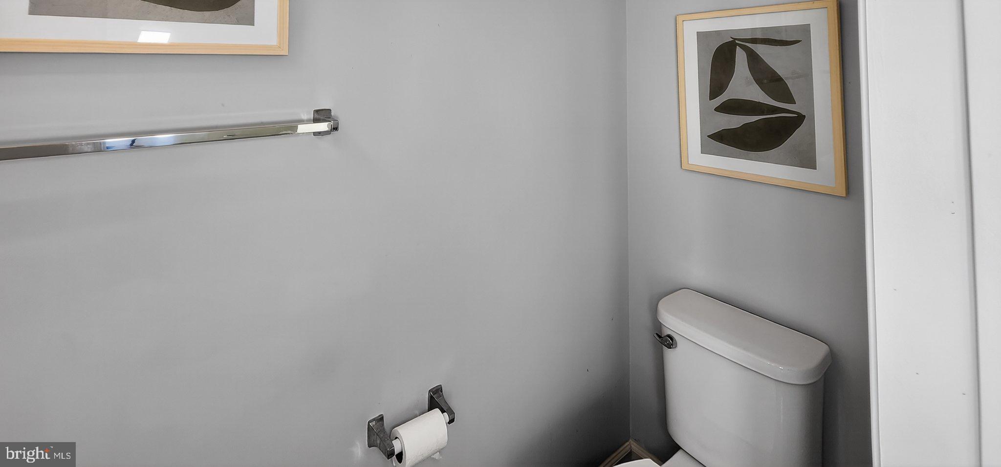 10570 Sally Ride Lane Lanham, MD 20706 - Photo 12 of 32 a bathroom with a toilet and a