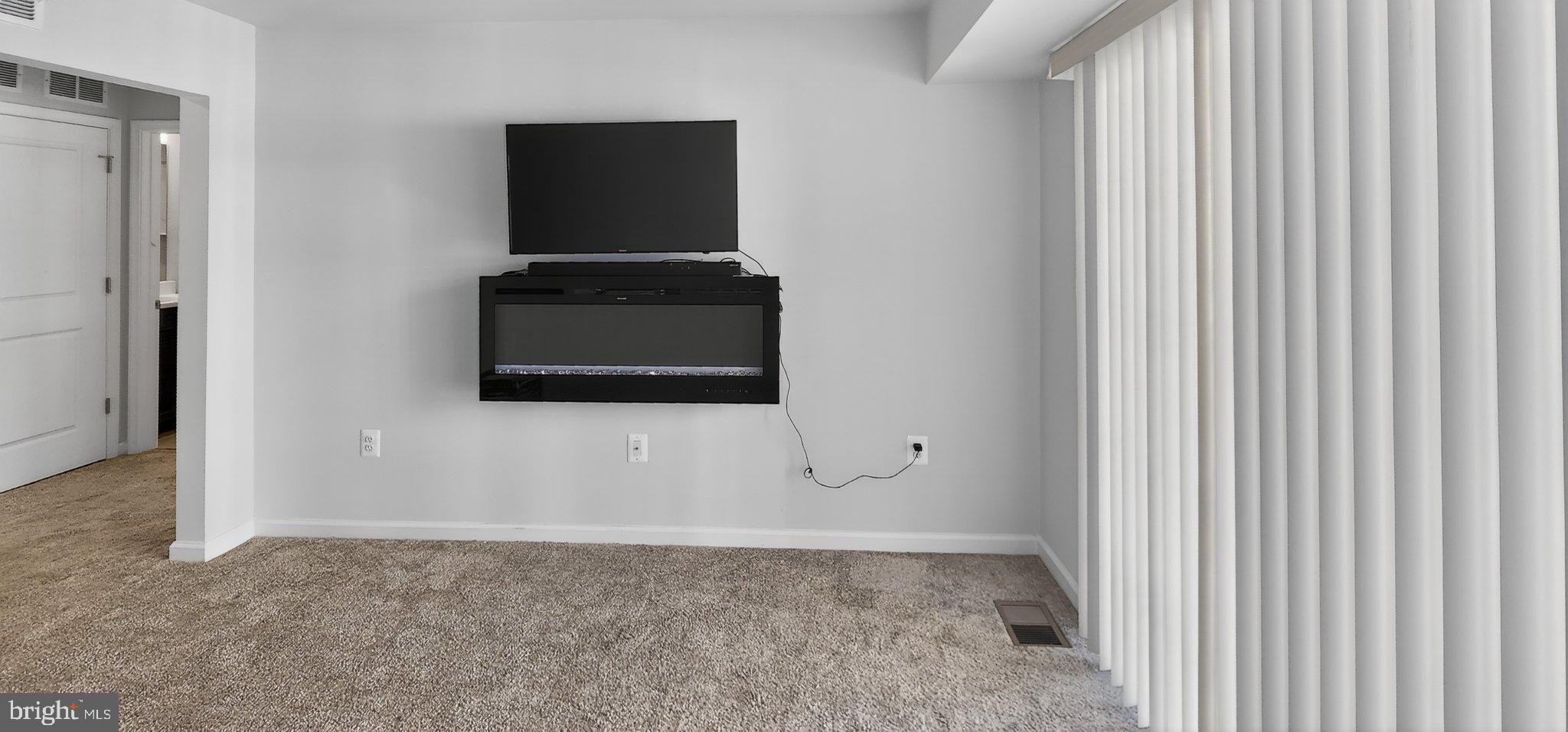 10570 Sally Ride Lane Lanham, MD 20706 - Photo 14 of 32 a view of a livingroom with an empty space