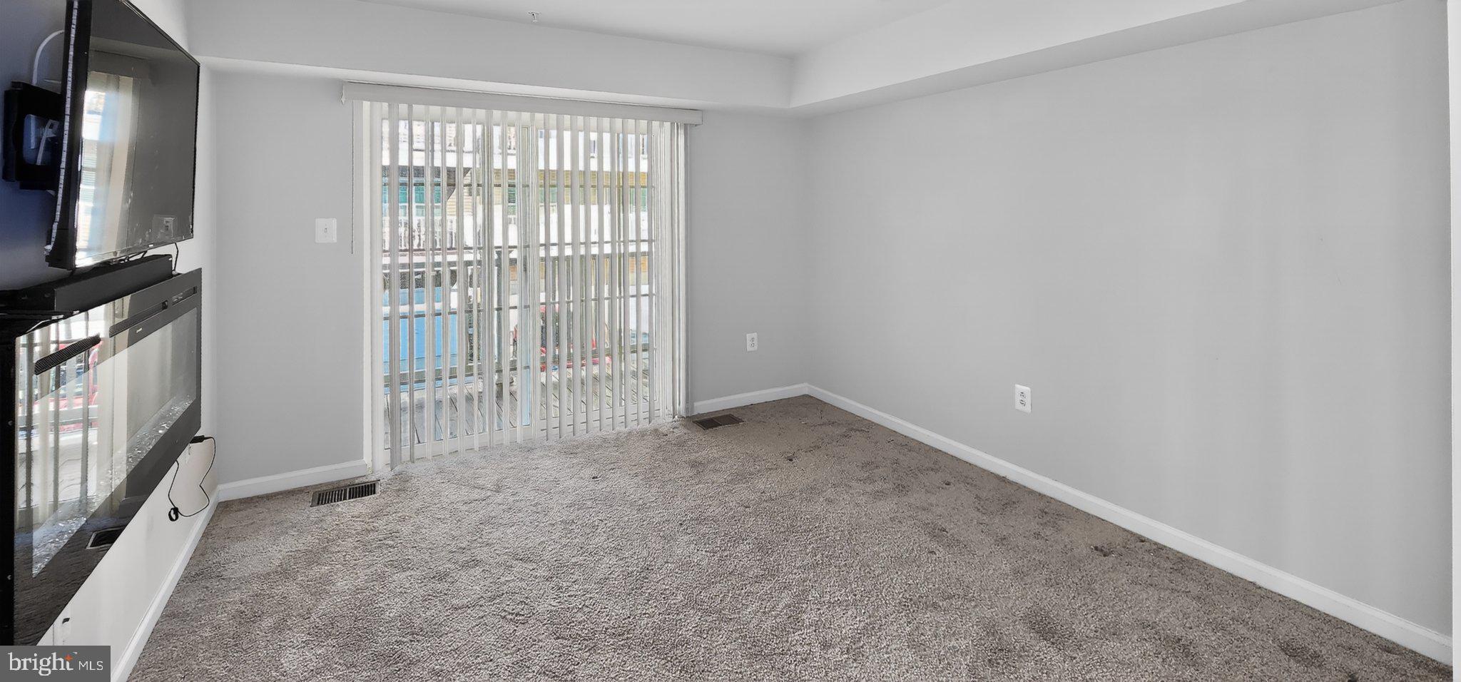 10570 Sally Ride Lane Lanham, MD 20706 - Photo 15 of 32 a view of an empty room with a window