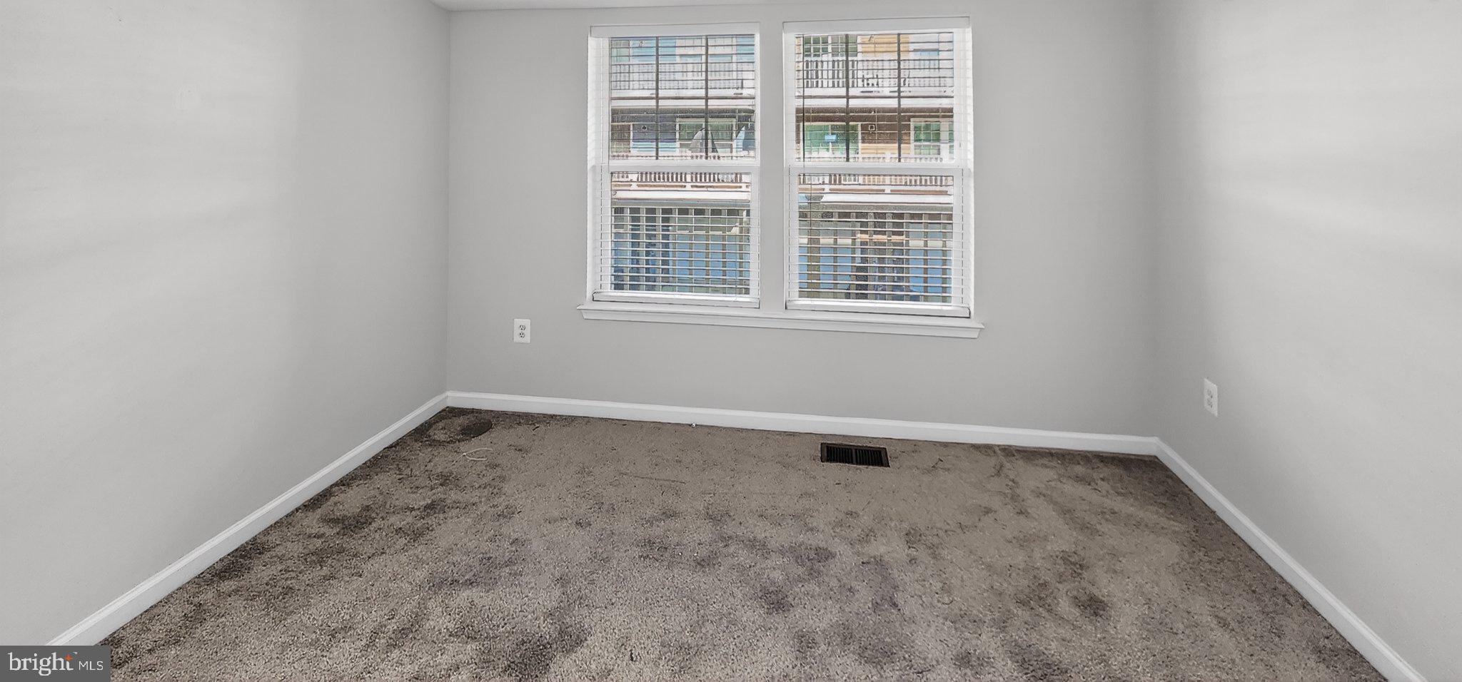 10570 Sally Ride Lane Lanham, MD 20706 - Photo 16 of 32 an empty room with a window