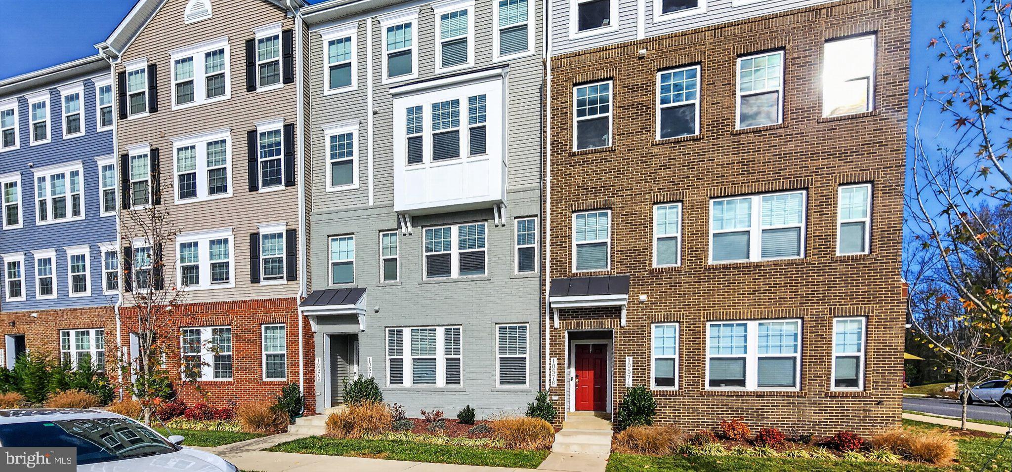10570 Sally Ride Lane Lanham, MD 20706 - Photo 2 of 32 a front view of a brick building