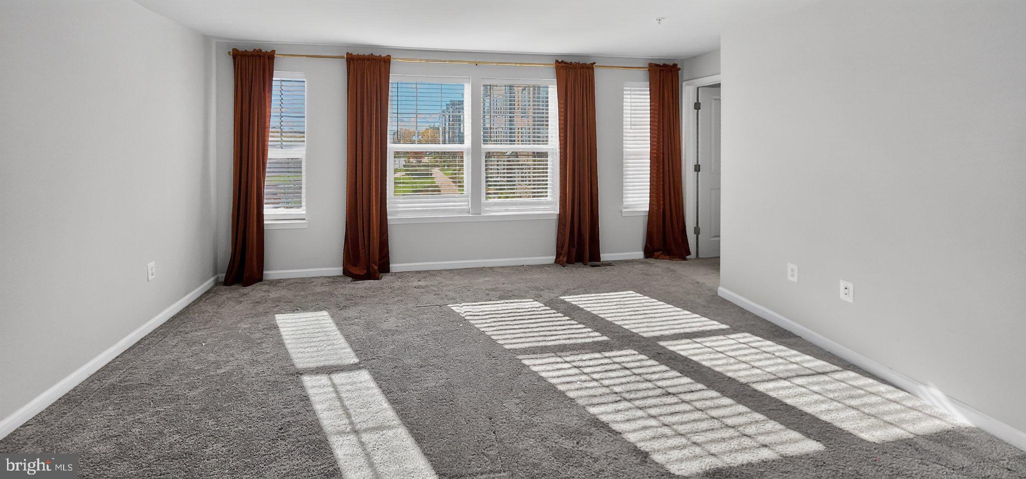 10570 Sally Ride Lane Lanham, MD 20706 - Photo 27 of 32 an empty room with windows