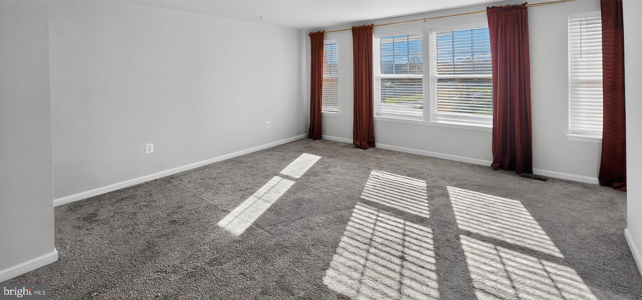 10570 Sally Ride Lane Lanham, MD 20706 - Photo 28 of 32 a view of wooden floor and windows in a room