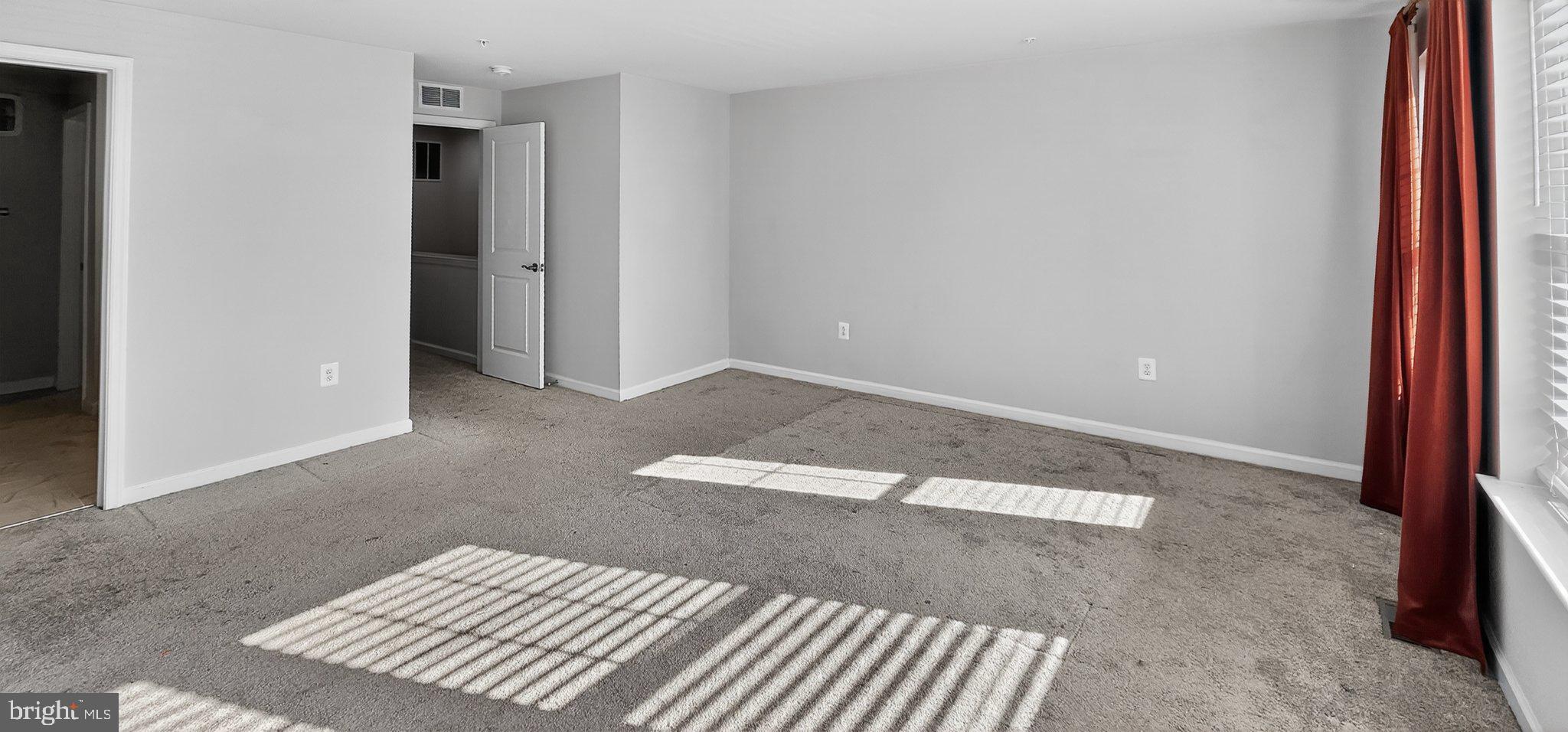 10570 Sally Ride Lane Lanham, MD 20706 - Photo 29 of 32 an empty room with windows