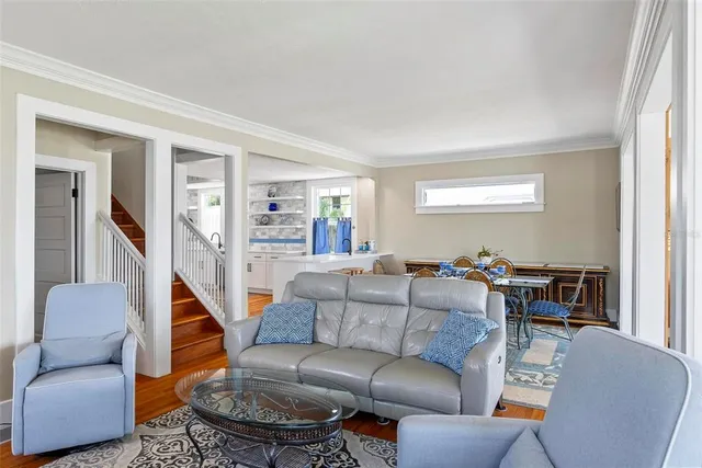 a bedroom with a bed and a mirror