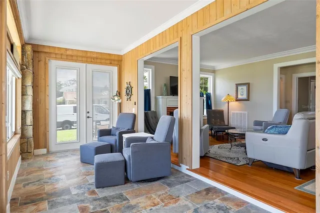 a view of an empty room with wooden roof