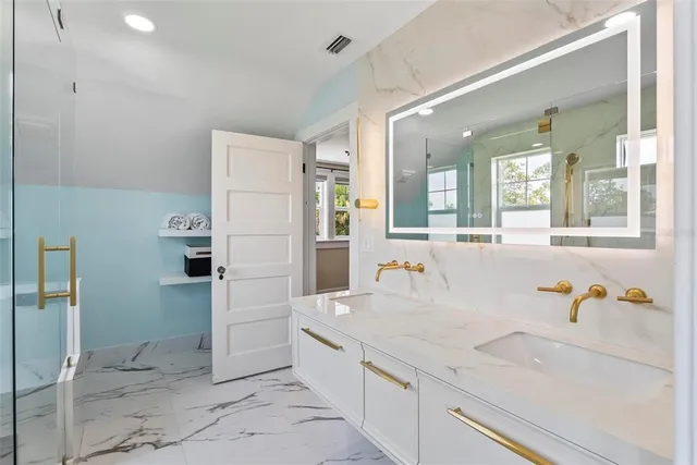 a view of storage and utility room with washer and dryer