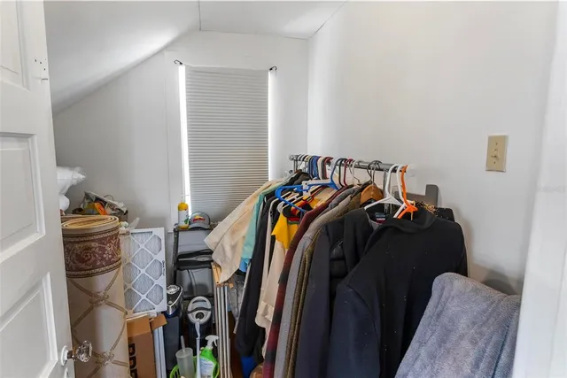a view of a swimming pool with a patio and a garden