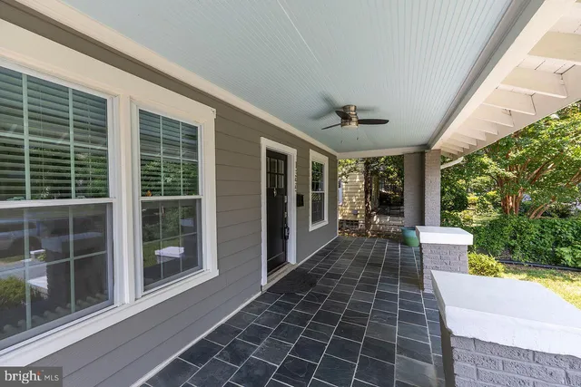 a view of a house with a large window