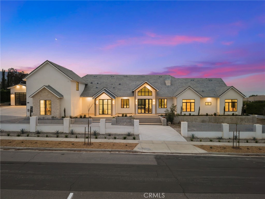 a view of multiple houses with a city street