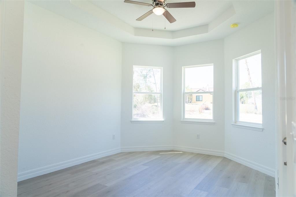 17820 Southwest 33rd Terrace Ocala, FL 34473 - Photo 15 of 35 a view of an empty room with a window