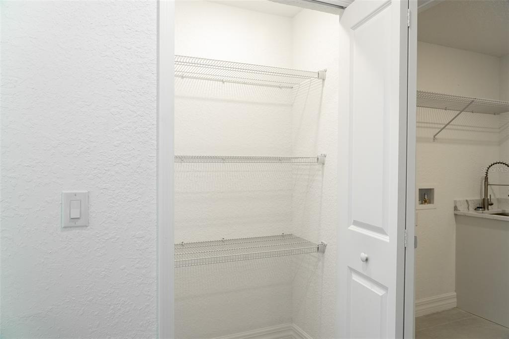 17820 Southwest 33rd Terrace Ocala, FL 34473 - Photo 24 of 35 a view of a room with washer and dryer