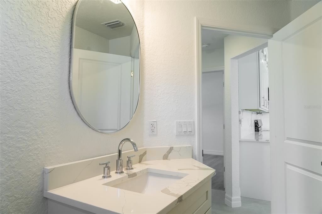 17820 Southwest 33rd Terrace Ocala, FL 34473 - Photo 29 of 35 a bathroom with a sink and a mirror